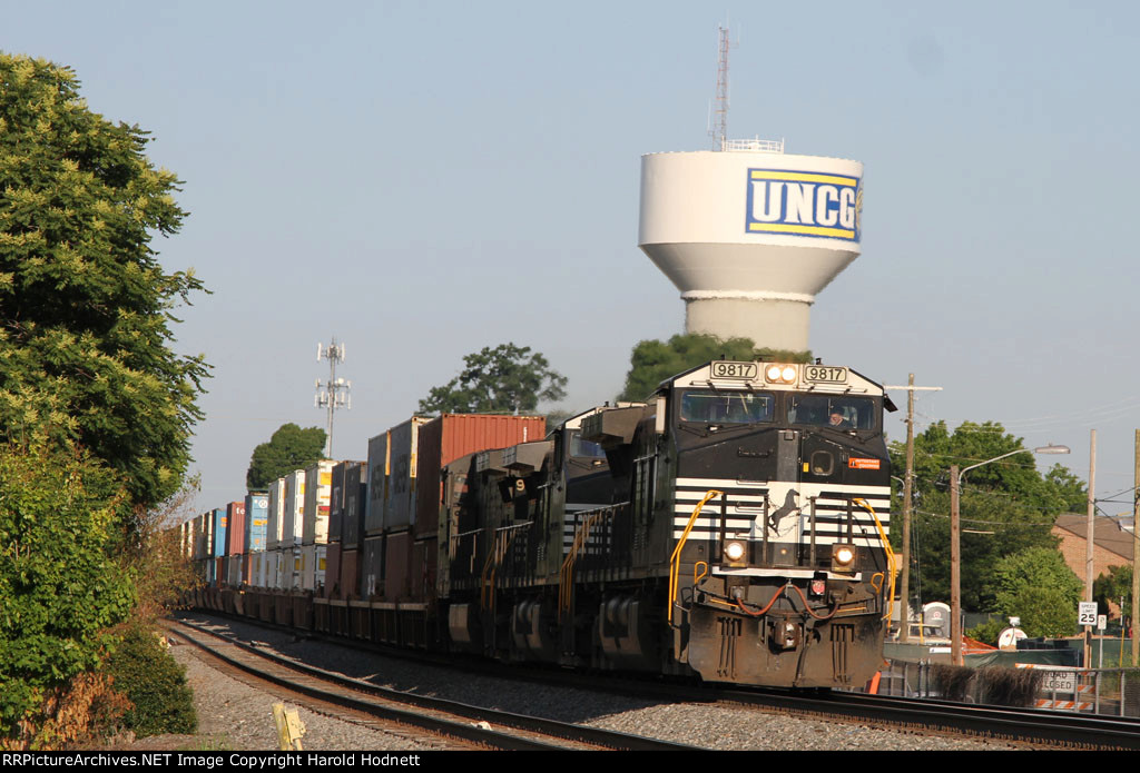 NS 9817 leads train 214 out of town